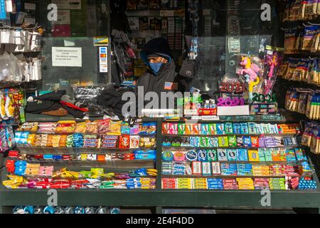 Kiosk News Stand on 42nd Street during the winter holiday season, amidst the Pandemic of COVID-19 at New York City NY USA on December 27 2020. Stock Photo
