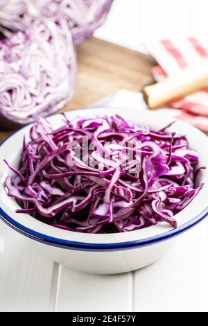 Sliced fresh red cabbage in bowl. Stock Photo