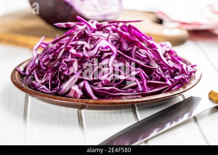 Sliced fresh red cabbage on plate. Stock Photo