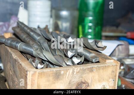 iron tools on the black board, set of tools on wood Stock Photo