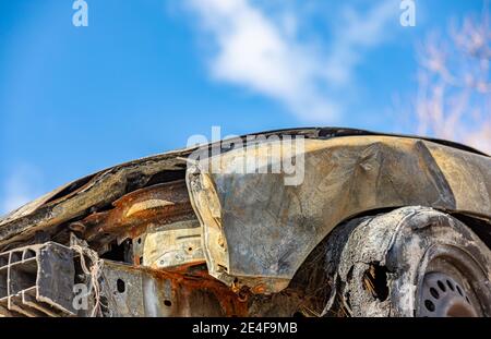 Detail image of extreme fire damage to a motor vehicle Stock Photo