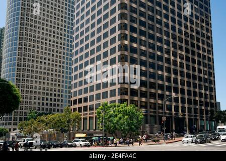 Street scene with traffic and office towers. City life outside Ernst & Young Plaza. 725 South Figueroa Street, Los Angeles, CA, USA. Aug 2019 Stock Photo