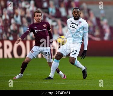 Scottish Championship - Heart of Midlothian v Raith rovers. Tynecastle Park, Edinburgh, Midlothian, UK. 23rd Jan, 2021. Hearts play host to Raith Rovers in the Scottish Championship at Tynecastle Park, Edinburgh. Pic shows: Hearts' winger, Elliott Frear, and Raith Rovers' forward, Gozie Ugwu, during the first half. Credit: Ian Jacobs/Alamy Live News Stock Photo