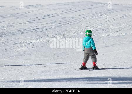 Little child skiing in Shahdag Ski Resort. Gusar - Azerbaijan: January 2019. Stock Photo