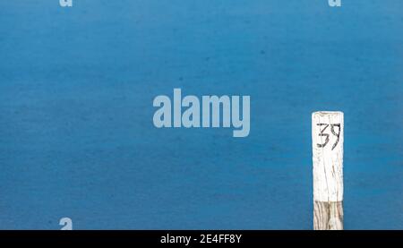 The number 39 on a post with a blue background Stock Photo