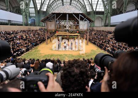 Models display creations by designer Karl Lagerfeld for Chanel Fall ...