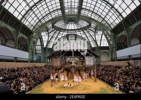 Models display creations by designer Karl Lagerfeld for Chanel Fall ...