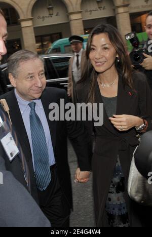 Jean Todt and his wife Malasian Michelle Yeoh arriving at the hotel Westin in Paris, France on October 23, 2009. Jean Todt was elected president of motor racings governing body FIA beating Finnish candidate Ari Vatanen. Todt was the big favorite after getting backing from outgoing FIA president Max Mosley and Formula One boss Bernie Ecclestone. The 63-year-old Frenchman was elected to a four-year term, beating Vatanen 135-49 in the voting at FIAs annual general meeting in Paris. The FIA said 12 votes were ruled as invalid or abstentions. Photo by ABACAPRESS.COM Stock Photo