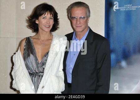 Actress Sophie Marceau and actor Christophe Lambert pose prior to the premiere of their film 'L'Homme De Chevet', held at the cinematheque, Paris, France, on November 9, 2009. Photo by Nicolas Genin/ABACAPRESS.COM Stock Photo