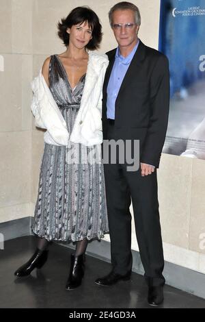 Actress Sophie Marceau and actor Christophe Lambert pose prior to the premiere of their film 'L'Homme De Chevet', held at the cinematheque, Paris, France, on November 9, 2009. Photo by Nicolas Genin/ABACAPRESS.COM Stock Photo