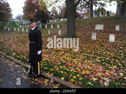 A military honor guard stands by as US President Barack Obama's motorcade drives through Arlington National Cemetery in Arlington, Virginia, USA on Veterans Day on November 11, 2009. Photo by Kevin Dietsch/ABACAPRESS.COM Stock Photo