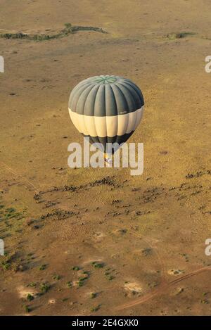 Hot Air Balloon Safari flying over the wide plains of Masai Mara National Reserve in Kenya Stock Photo
