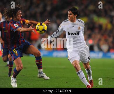 Barcelona's Carles Puyol and Real Madrid's Kaka battle for the ball during the Spanish First League Soccer Match, FC Barcelona vs Real Madrid at Nou Camp stadium in Barcelona, Spain on November 29, 2009. Barcelona won 1-0. Photo by Christian Liewig/ABACAPRESS.COM Stock Photo