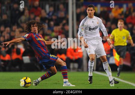 Barcelona's Carles Puyol and Real Madrid's Cristiano Ronaldo during the Spanish First League Soccer Match, FC Barcelona vs Real Madrid at Nou Camp stadium in Barcelona, Spain on November 29, 2009. Barcelona won 1-0. Photo by Christian Liewig/ABACAPRESS.COM Stock Photo