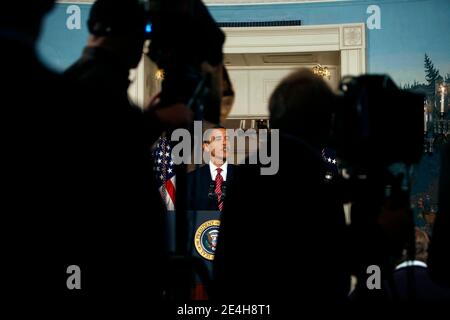 US President Barack Obama makes a statement on the economy in the Diplomatic Room of the White House in Washington DC, USA on on December 14, 2009. Photo by Dennis Brack/ABACAPRESS.COM Stock Photo