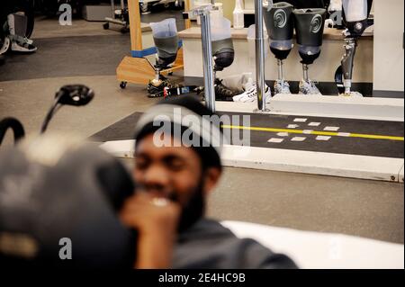 Sgt. Robert Samuel attends a physical therapy session at walter reed in Washington, DC, USA, on December 18, 2009. Samuel did a tour in Iraq and was in his 2nd tour in afghanistan, when 5 months in, his stryker group was hit by an ied at 5:30 am. and was the only person is 8-man unit to be hurt. He's been at Walter Reed since Nov 17, had his left leg amputated above the knee and his Left arm has a metal plate and lots of stitches. Photo by Olivier Douliery /ABACAPRESS.COM Stock Photo