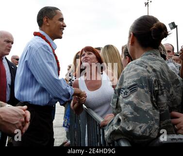 US President Barack Obama greets well-wishers at Hickam Air Force Base in Honolulu, HI, USA on December 24, 2009. Photo by Kent Nishimura/ABACAPRESS.COM Stock Photo