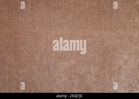 The texture of coarse brown fabric. Is used for upholstery of rustic furniture. Stock Photo