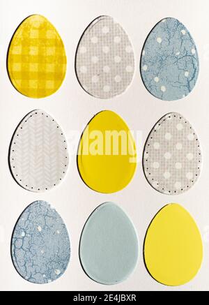 Paper cut out Easter eggs isolated on white background. Greeting card design. Stock Photo