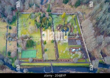 Victorian old walled garden and tennis court in private grounds Stock Photo