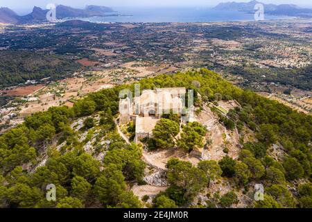 Spain, Balearic Islands, Majorca, Pollena, Town and Santuario del Puig de Maria, aerial view Stock Photo