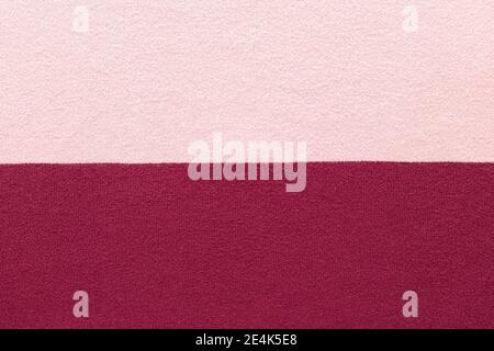 pink and burgundy knitted texture. horizontal stripes Stock Photo