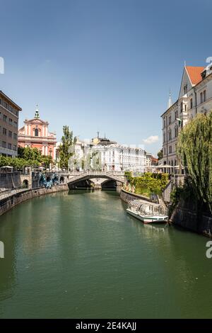 Slovenia, Ljubljana, Old town with Tromostovje (Triple Bridge) over Ljubljanica river Stock Photo