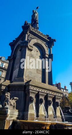 Clermont Ferrand. Volcanic stone fountain of Place de la Victoire. Puy de Dome. Auvergne-Rhone-Alpes. France Stock Photo