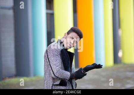 Portrait of elegant young man in town Stock Photo