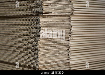 New cartons for packing are stacked in a stock Stock Photo