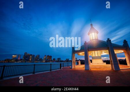 East Boston Piers Park Gazebo with lighthouse light in the evening Stock Photo