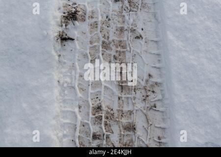 Tire tracks in the snow, Winter Driving Stock Photo