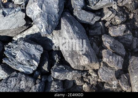 Coal is large lumps. Fuel for the boiler. House heating. Stock Photo