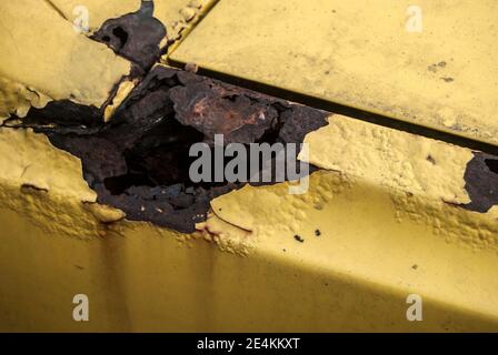 Rusty part of old weathered vintage car body closeup Stock Photo