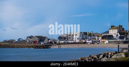 Lyme Regis, Dorset, UK. 24th Jan, 2021. UK Weather: A bright, sunny and cold day at the seaside resort town of Lyme Regis during the third national lockdown. Credit: Celia McMahon/Alamy Live News Stock Photo