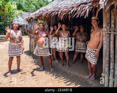 Iquitos, Peru- December 11 2019: Indian from Bora tribe in his local costume. Amazonia. Latin America. Amazon River Basin. Stock Photo