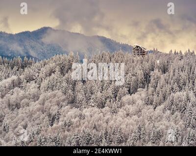 Abandoned construction building in the Carpathian Mountains Romania. Mountain hut under construction in Predeal, Romania. Stock Photo