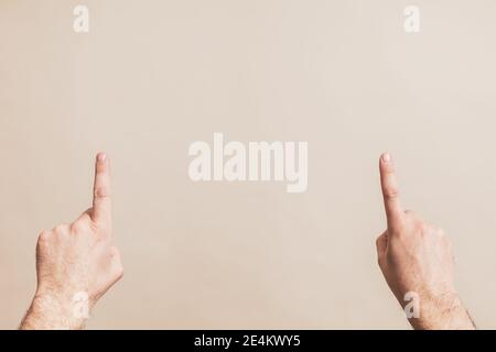 Close up image of male hands pointing. Stock Photo