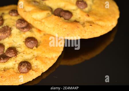 Two Round Cookies Two whole round, sand-colored, fragrant tasty fresh cookies with pieces ...