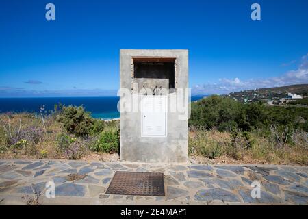 exterior concrete box electric access, in street of urbanization without build, with cables and hole for the control panel Stock Photo