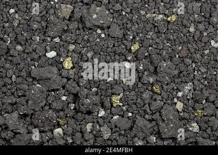 paydirt with some gold nuggets for background use Stock Photo