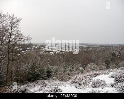 CROYDON, UK - 24 JUANARY  2020: Croham Hurst looking towards South Croydon, London.  In the snow. Stock Photo