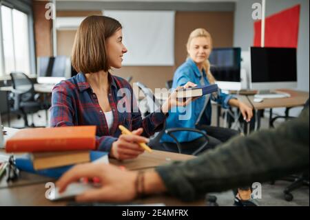 Two female IT specialists works on computers Stock Photo