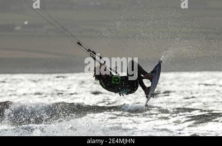 Kite surfer suspended in the air Stock Photo