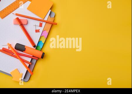 Office stationery supplies on opened notepad Stock Photo
