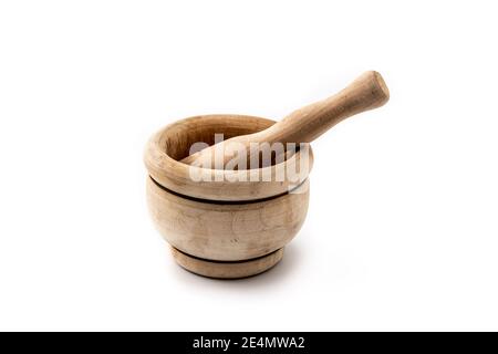 Wooden mortar and pestle isolated on white background Stock Photo