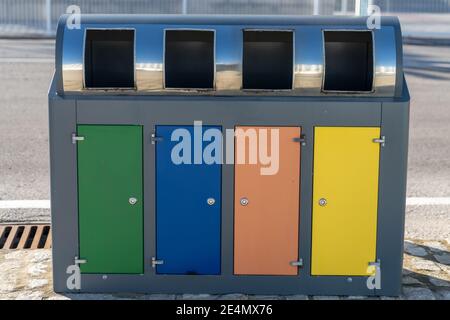 close up of colorful metal trash bins used for recycling Stock Photo