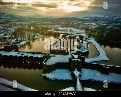 Caerphilly Castle surrounded by snow in South Wales, UK Stock Photo