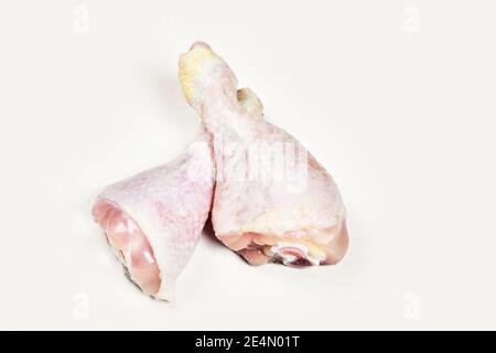 Raw chicken legs isolated on white background Stock Photo