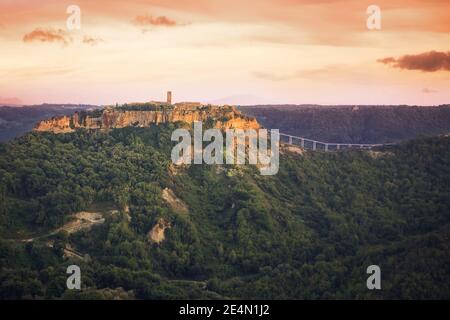 Beautiful panoramic view of famous Civita di Bagnoregio with Tiber valley at sunset, Lazio, Italy Stock Photo